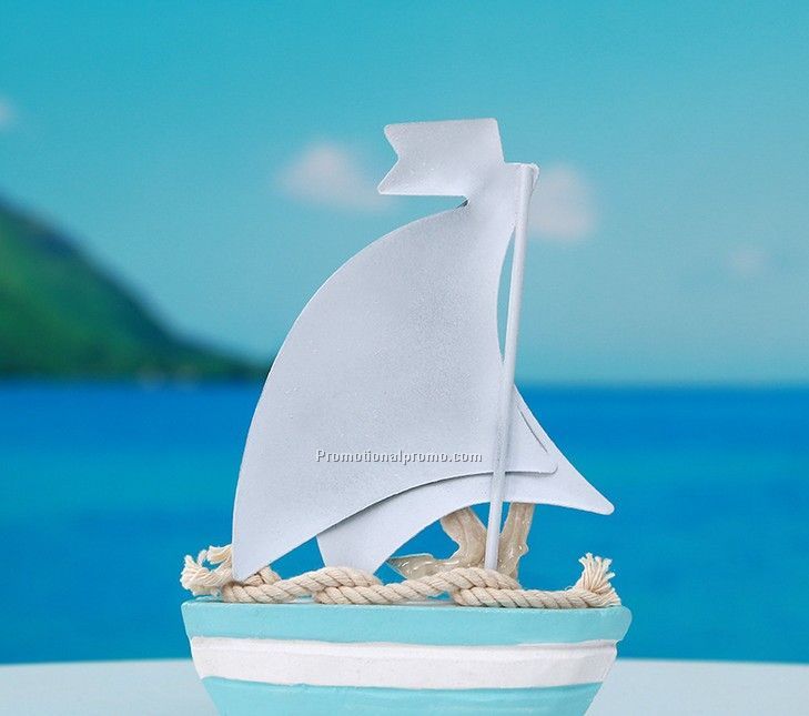 wooden sailing boat with colored drawing Photo 2