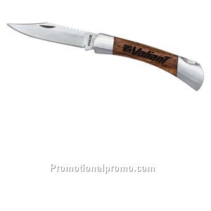 Small pocket knife features silver accent on rich rosewood handle.