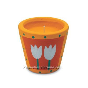 Candle in ceramic pot
