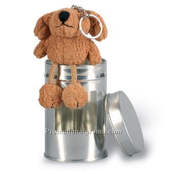 Plush dog in tin box