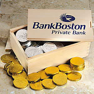 Chocolate stock coins in wooden box