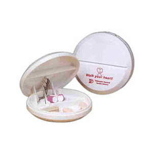 Pill box and cutter.