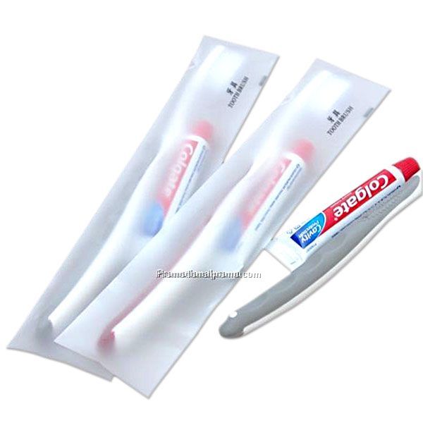 toothbrush and Colgate toothpaste kit