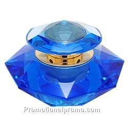 Crystal and metal perfume bottles