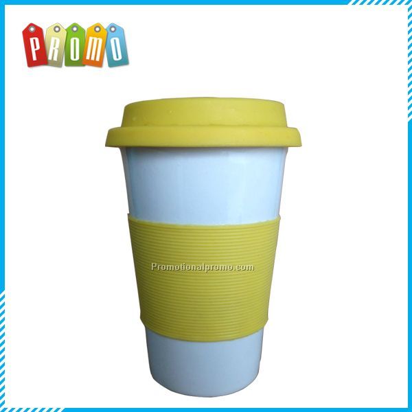 Promotional Ceramic travel mug with silicone lid and silicone removable part
