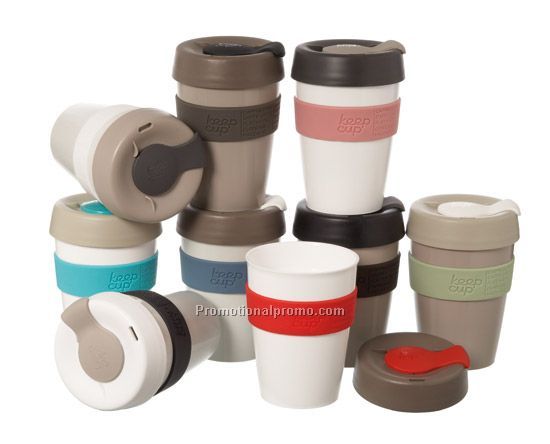 Ceramic cup with silicone lid and sleeve