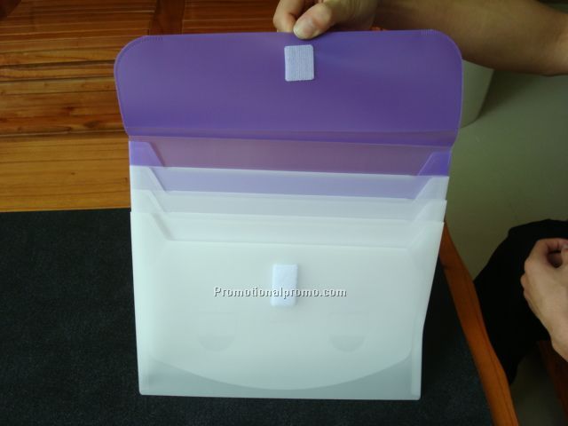 Expanding File W/ Elastic Closure