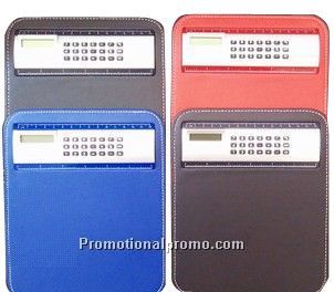 Calculator mouse pad with a ruler