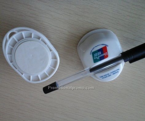 Plastic pen holder with adhesive on the back
