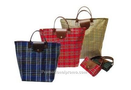 Folding shopping bag with plastic handle