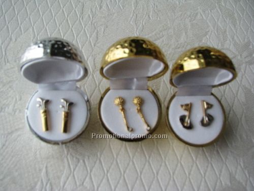 Earrings in golf ball