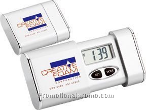 Slide out travel alarm clock