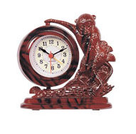 MONKEY-HOLDING ALARM CLOCK